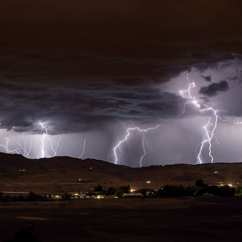 night photo of stacked lightning panoramic