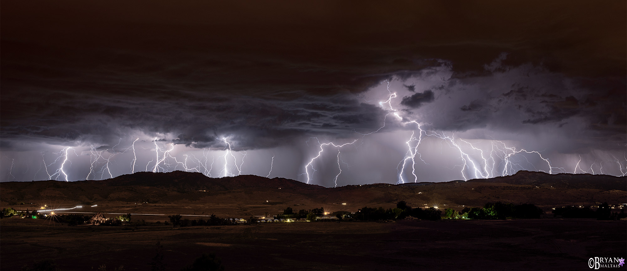 night photo of stacked lightning panoramic