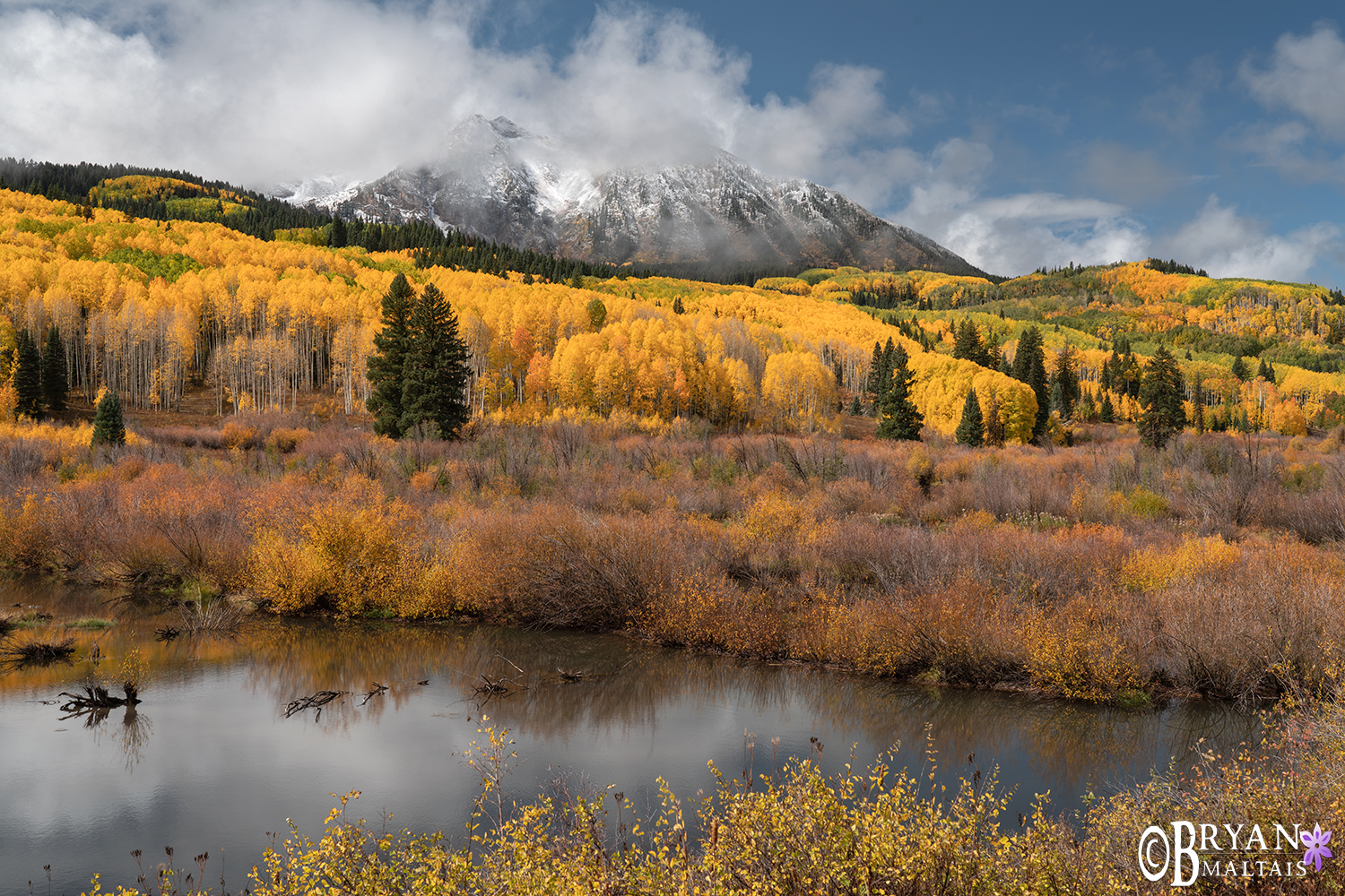 East Beckwith Peak snow clouds fall colors crested butte colorado