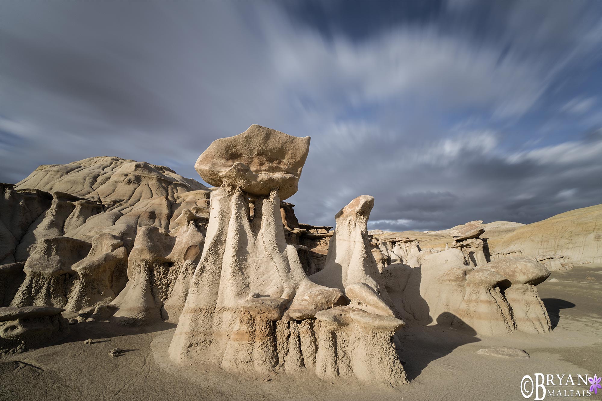 bisti badlands clamshell hoodoo long exposure blurry clouds